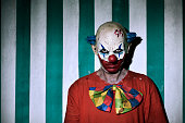 scary evil clown in the circus