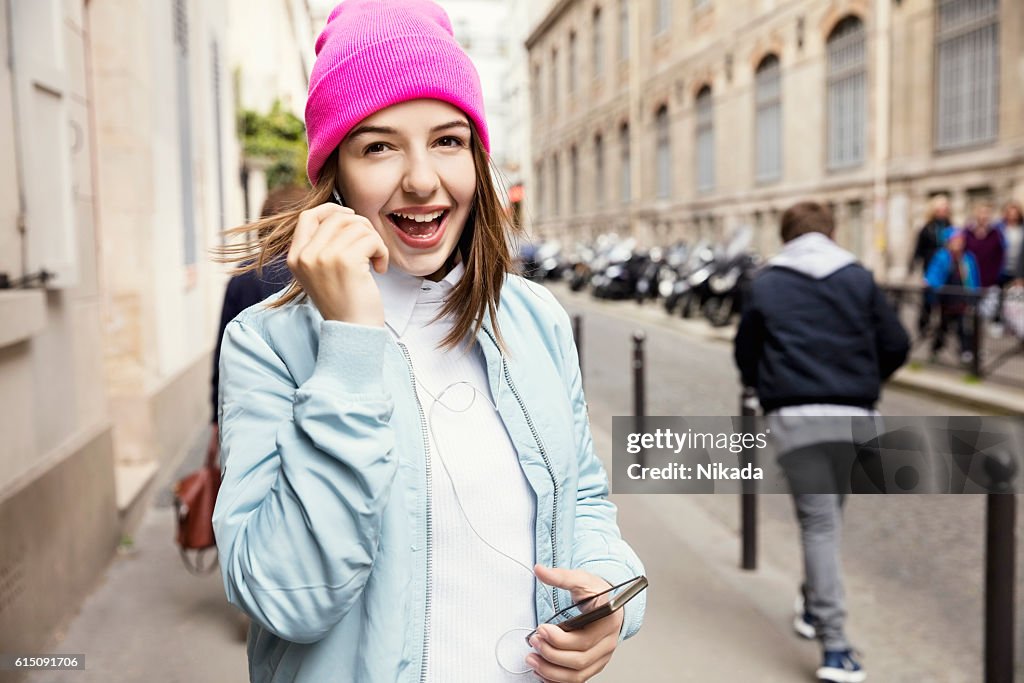 Teenager girl listening music