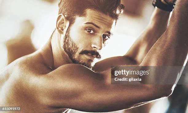 portrait of a handsome muscular man. - man desire stock pictures, royalty-free photos & images