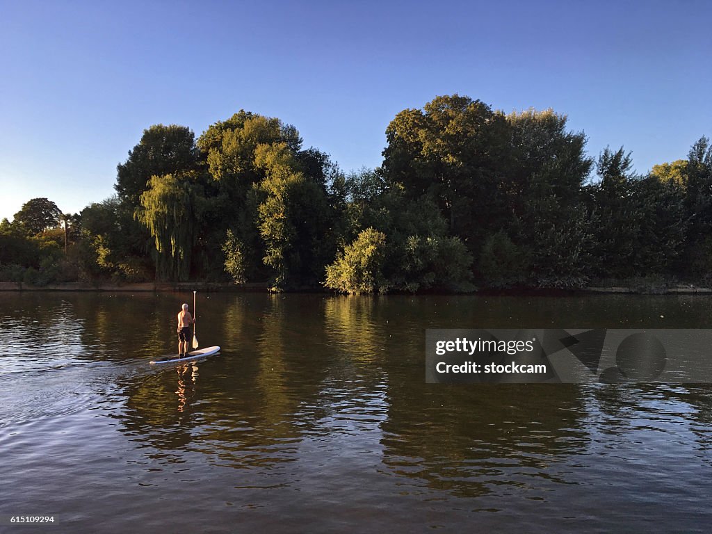 Paddleboarding on River Thames near Richmond, UK