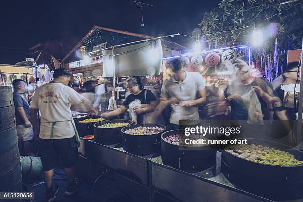 street market and busy day - night market stock pictures, royalty-free photos & images