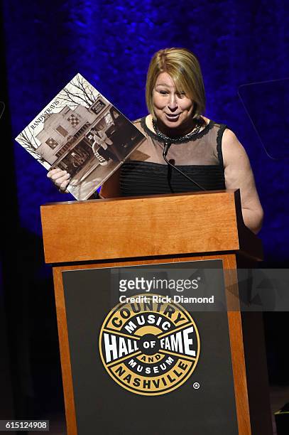 Sarah Trahern honors inductee Randy Travis onstage during the 2016 Medallion Ceremony at Country Music Hall of Fame and Museum on October 16, 2016 in...