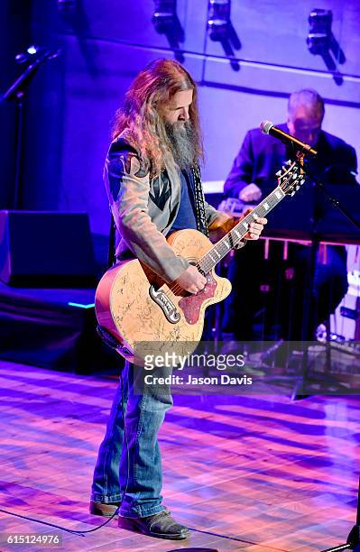 Jamey Johnson performs 'Long-Haired Country Boy' to honor Charlie Daniels onstage during the 2016 Medallion Ceremony at Country Music Hall of Fame...