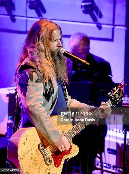 Jamey Johnson performs 'Long-Haired Country Boy' to honor Charlie Daniels onstage during the 2016 Medallion Ceremony at Country Music Hall of Fame...