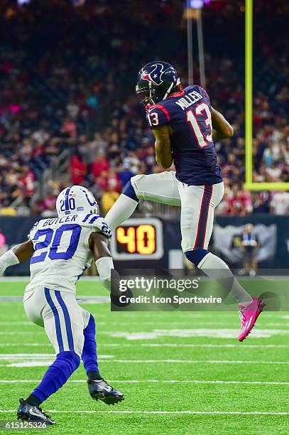 Houston Texans Wide Receiver Braxton Miller makes a big second half catch as Indianapolis Colts Cornerback Darius Butler defends during the NFL game...