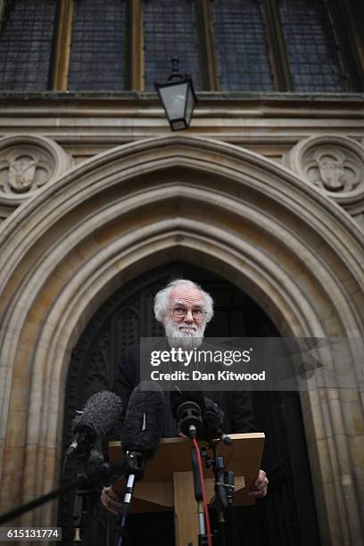 Former Archbishop of Canterbury Dr Rowan Williams speaks to the media outside Croydon Minster on October 17, 2016 in Croydon, England. Fourteen...