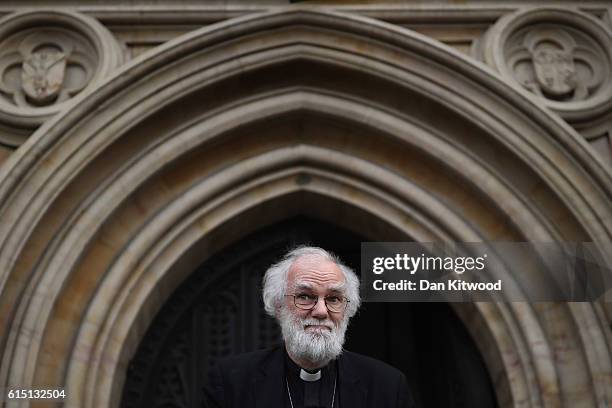 Former Archbishop of Canterbury Dr Rowan Williams speaks to the media outside Croydon Minster on October 17, 2016 in Croydon, England. Fourteen...