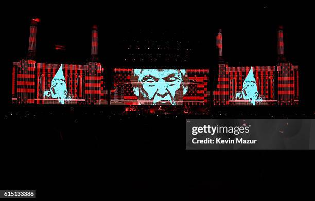 An illustration of Donald Trump appears on the screen during Roger Waters performance at Desert Trip at The Empire Polo Club on October 16, 2016 in...