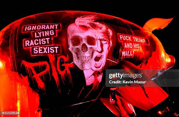 The Trump pig floats over the crowd during Roger Waters performance at Desert Trip at The Empire Polo Club on October 16, 2016 in Indio, California.