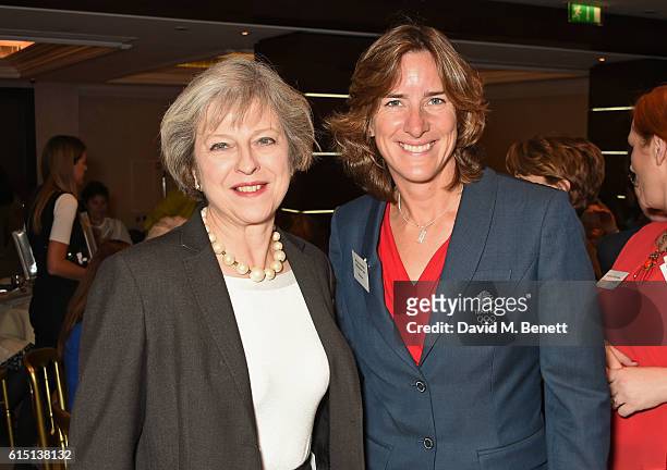 British Prime Minister Theresa May and Olympian Katherine Grainger attend The 61st Women of the Year lunch and awards 2016 at InterContinental Park...