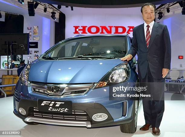 Brazil - Honda Motor Co. President Takanobu Ito stands by the "FIT twist," which was developed exclusively for the Brazilian market, in unveiling the...