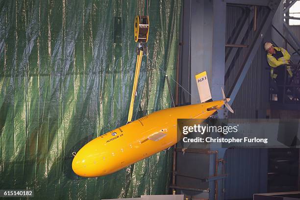 An Autosub, autonomous submarine, is displayed during the keel-laying ceremony of the new polar research ship for Britain, RRS Sir David...
