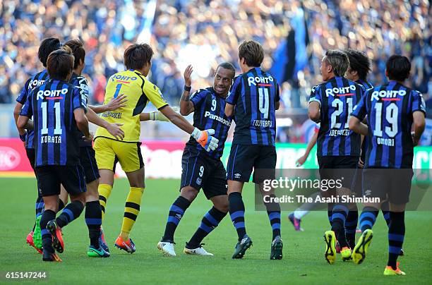 Ademilson of Gamba Osaka celebrates scoring his team's first goal with his team mates during the J.League Levain Cup Final match between Gamba Osaka...