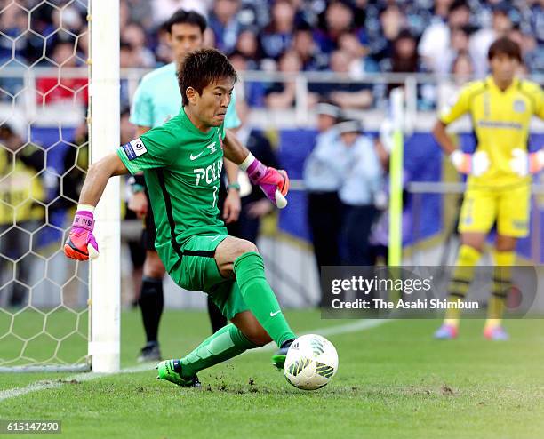 Shusaku Nishikawa of Urawa Red Diamonds saves the penalty at the penalty shootout during the J.League Levain Cup Final match between Gamba Osaka and...