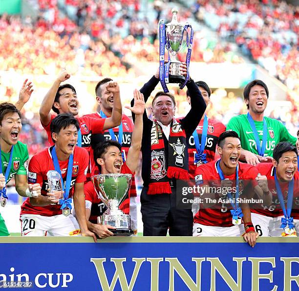 Head coach Mihailo Petrovic of Urawa Red Diamonds lifts the trophy after the J.League Levain Cup Final match between Gamba Osaka and Urawa Red...