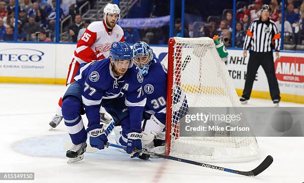 Victor Hedman and Ben Bishop of the Tampa Bay Lightning defend against Detroit Red Wings during a game at the Amalie Arena on October 13, 2016 in...