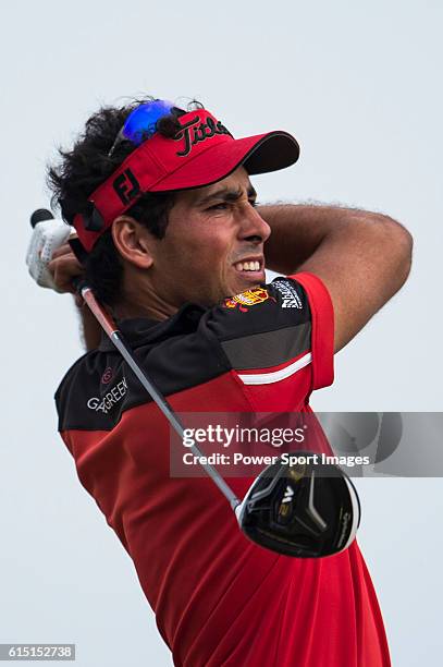 Carlos Pigem of Spain plays a shot during round four of the 2016 Venetian Macao Open at Macau Golf and Country Club on October 16, 2016 in Macau,...