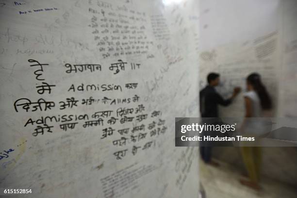 The wall of the Radha Krishna temple in Kota’s Talwandi is popular among students scribble their wishes in the hope that their prayers will be...