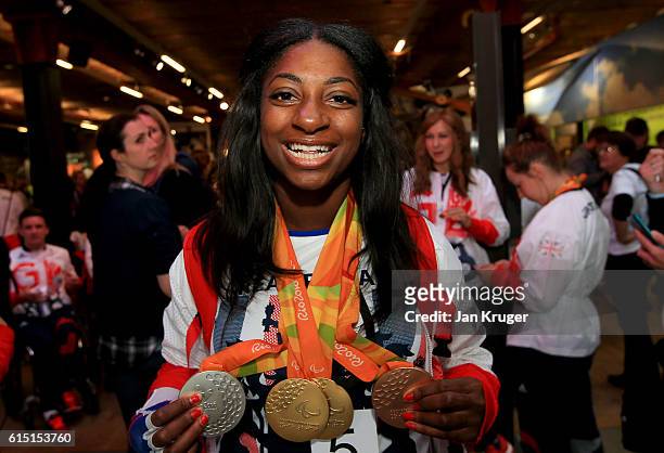 Kadeena Cox of Great Britain poses with her medals before a Rio 2016 Victory Parade for the British Olympic and Paralympic teams on October 17, 2016...