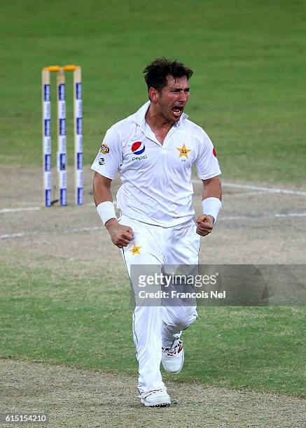 Yasir Shah of Pakistan celebrates after dismissing Roston Chase during of West Indies Day Five of the First Test between Pakistan and West Indies at...