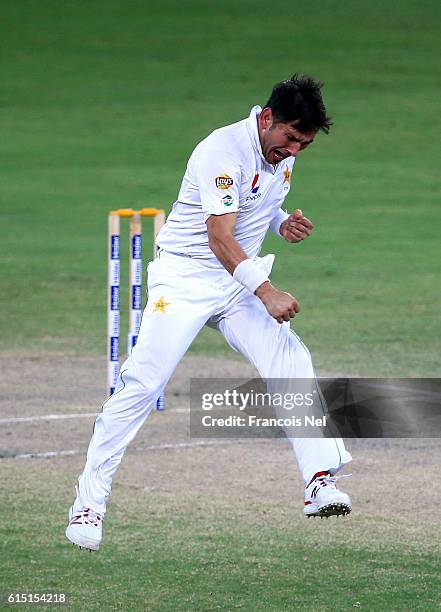 Yasir Shah of Pakistan celebrates after dismissing Roston Chase during of West Indies Day Five of the First Test between Pakistan and West Indies at...