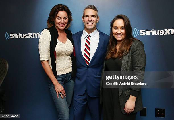 Personality Luann de Lesseps poses with hosts Andy Cohen and Taylor Strecker during a taping of SiriusXM's 'Radio Andy' at the SiriusXM Studios on...