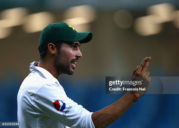 Mohammad Amir of Pakistan gestures during Day Five of the First Test between Pakistan and West Indies at Dubai International Cricket Ground on...