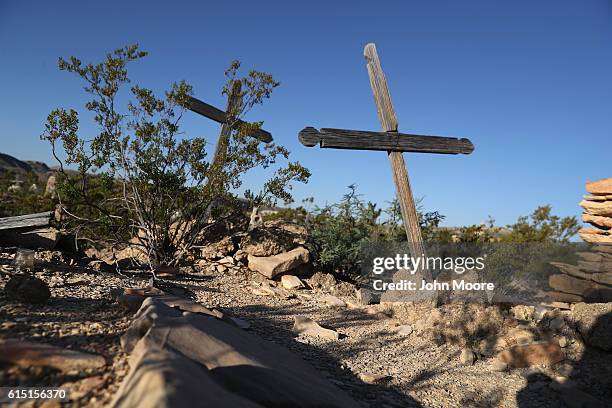 The cemetery of a mining ghost town lies in West Texas' Big Bend on October 16, 2016 in Terlingua, Texas. The current bohemian community in Terlingua...