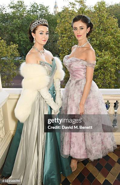 Models pose at a presentation featuring costumes from new Netflix Original series "The Crown" with designer Michele Clapton at the ICA on October 17,...