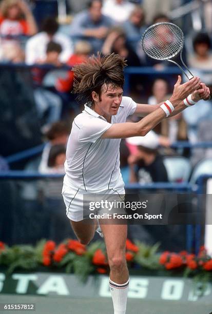 Jimmy Connors of the United States hits a return during a match in the Men's 1981 US Open Tennis Championships circa 1981 at the USTA National Tennis...