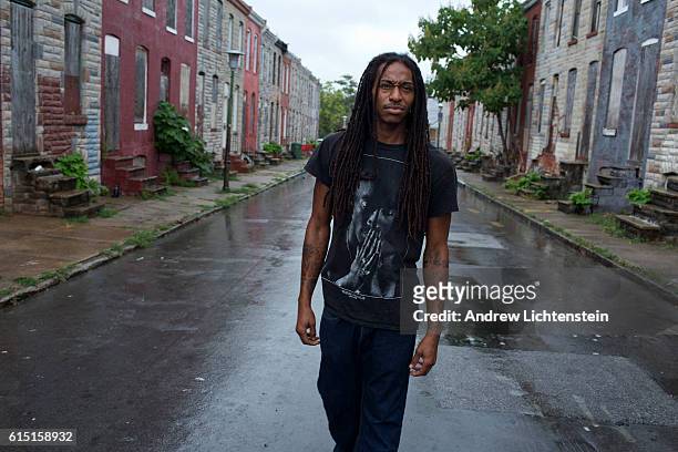 Donald Curby walks on his home block on a block in East Baltimore which has been mostly abandoned, September 19, 2016.. "Take a look around" he told...