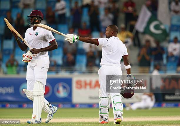 Darren Bravo of West Indies celebrates reaching his century during Day Five of the First Test between Pakistan and West Indies at Dubai International...