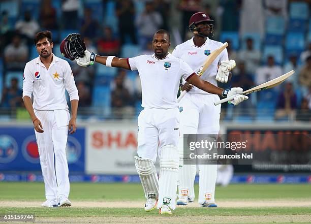 Darren Bravo of West Indies celebrates reaching his century during Day Five of the First Test between Pakistan and West Indies at Dubai International...
