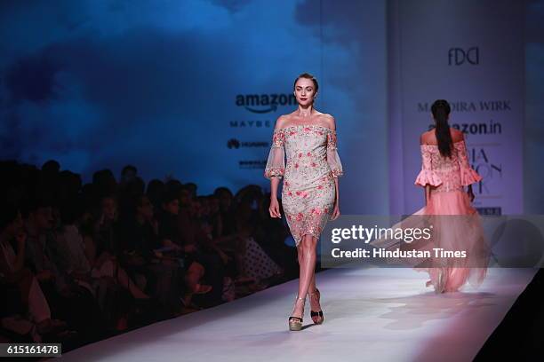 Model showcases the creation of designer Mandira Wirk during Amazon India Fashion Week Spring-Summer 17 at NSIC Exhibition Complex on October 15,...