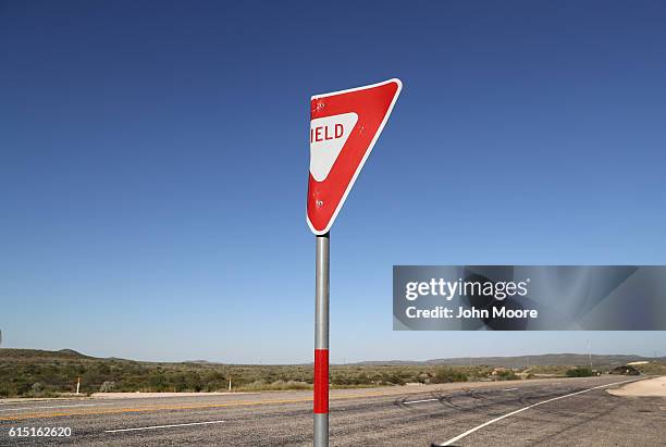 Highway sign stands near the U.S.-Mexico border on October 16, 2016 in Landry, West Texas. In Texas late 1800s history, Landry was known for Judge...