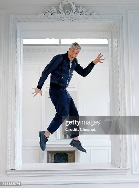 Italian artist Maurizio Cattelan poses prior to the opening of the exhibition "Not Afraid of Love" at the Hotel de la Monnaie on October 17, 2016 in...