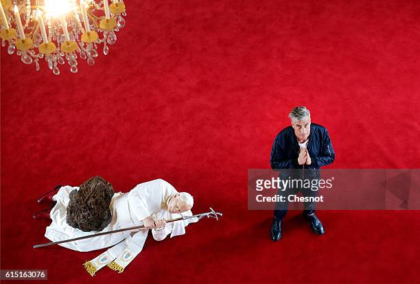 Italian artist Maurizio Cattelan poses next to his artwork "La Nona Ora" prior to the opening of the exhibition "Not Afraid of Love" at the Hotel de...