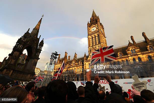 Rainbow forms over Manchester Town Hall in Albert Square as crowds cheer members of Team GB during a Rio 2016 Victory Parade for the British Olympic...