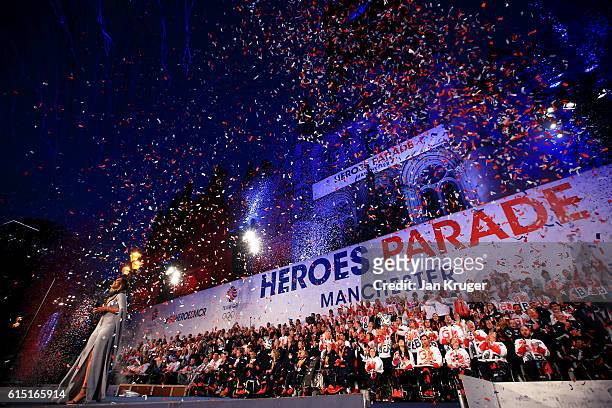 Ticker tape fills the air as members of Team GB celebrate on stage outside Manchester Town Hall in Albert Square after a Rio 2016 Victory Parade for...