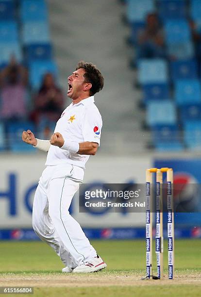 Yasir Shah of Pakistan celebrates after dismissing Darren Bravo of West Indies during Day Five of the First Test between Pakistan and West Indies at...