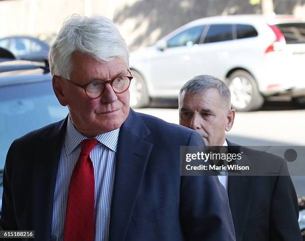 Retired Gen. James Cartwright, , arrives for a hearing with his attorney Greg Craig , at US District Court, October 17, 2016 in Washington, DC....