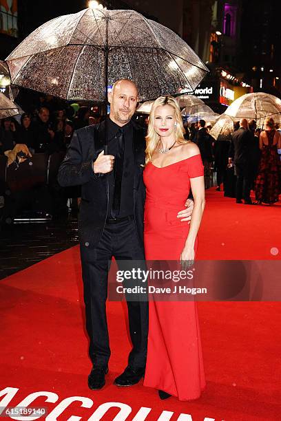 Director Gavin O'Connor and Brooke Burns attend the UK Premiere of "The Accountant" at Cineworld Leicester Square on October 17, 2016 in London,...
