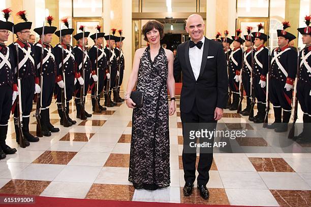 Switzerland's Interior Minister Alain Berset and his wife Muriel Zeender Berset pose during a Gala Dinner in Bern on October 17, 2016. President of...