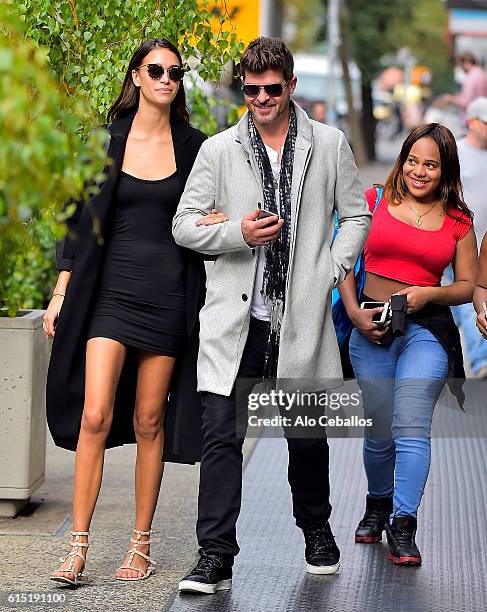 Robin Thicke, April Love Geary are seen in Soho on October 17, 2016 in New York City.