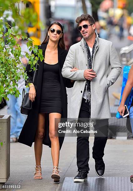 Robin Thicke, April Love Geary are seen in Soho on October 17, 2016 in New York City.