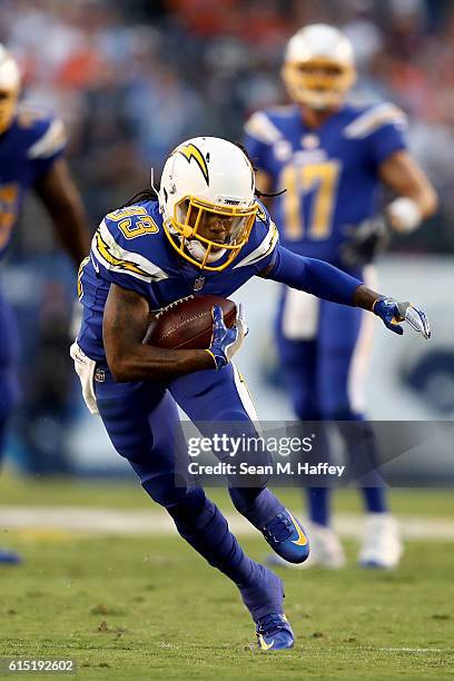 Dexter McCluster of the San Diego Chargers runs the ball during the first half of a game against the Denver Broncos at Qualcomm Stadium on October...