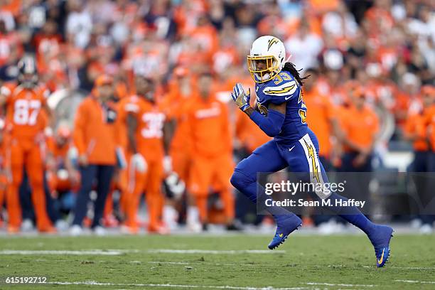 Dexter McCluster of the San Diego Chargers runs the ball during the first half of a game against the Denver Broncos at Qualcomm Stadium on October...