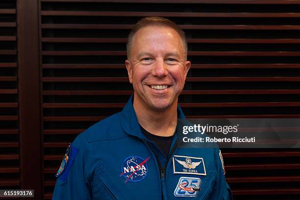 American NASA astronaut Tim Kopra poses for a photo after attending "Experiments in space" at Usher Hall on October 17, 2016 in Edinburgh, Scotland.