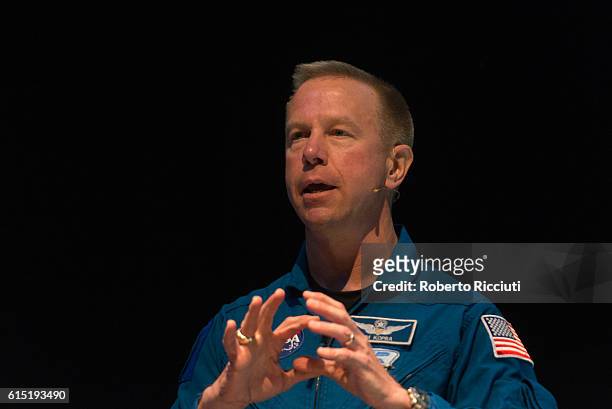 American NASA astronaut Tim Kopra speaks on stage for "Experiments in space" at Usher Hall on October 17, 2016 in Edinburgh, Scotland.