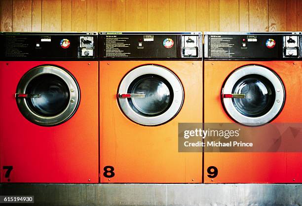 three washing machines - prince of orange stock-fotos und bilder
